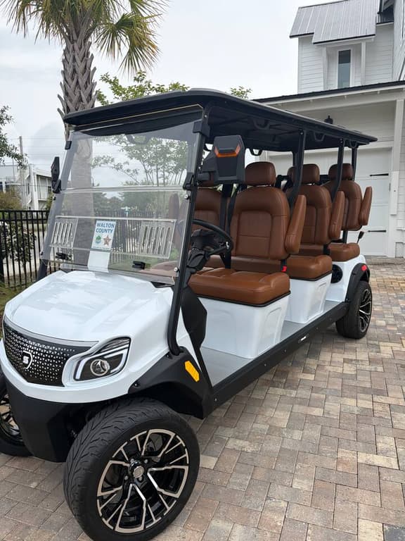 "Your 6-seater luxury LSV golf cart-included with every stay. Explore all of 30A in style."
